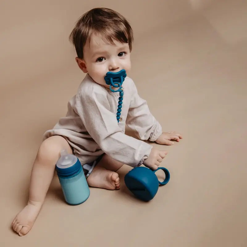 Suavinex Portaciuccio in Silicone con Maniglia, +0 mesi, Blu Ballad